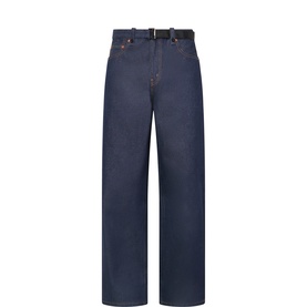 Sacai indigo wide-leg jeans with integrated black buckle belt, straight cut, in 100% cotton denim
