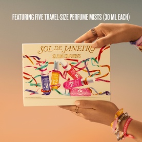 Sol De Janeiro Sol Many Compliments Gift Set featuring five 30ml travel-size perfume mists, held open to display colourful bottles inside.