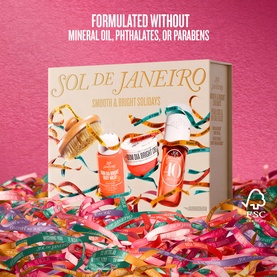 Sol De Janeiro Smooth & Bright Solidays Gift Set box with colourful ribbon confetti on a pink background