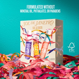Sol De Janeiro Sol & Cheer Gift Set box displayed with colourful paper streamers on a teal background, containing three fragrance products.