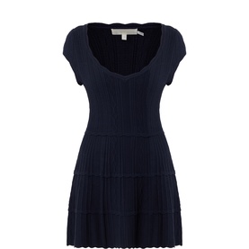 LOVESHACKFANCY dress in Midnight Kiss, navy ribbed knit, scoop neck, cap sleeves, flared pleated skirt