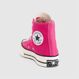 Converse Chuck 70 high-top trainer in pink canvas with cream sole, black lace-up fastening, and signature All Star heel patch