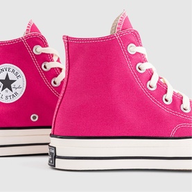 Converse Chuck 70 high-top trainers in pink canvas with white laces, cream midsole and black rubber sole