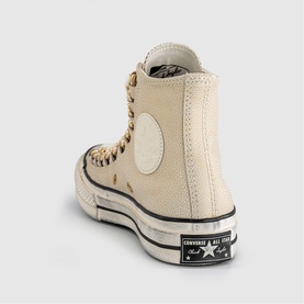 Converse Chuck 70 high-top trainer in egret, textured canvas upper, leopard print lace detail, black and white chunky sole, rear view