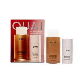 Ouai Healthy Hair for the Holidays hair care gift set with shampoo, conditioner, and travel-size bottles in red branded box
