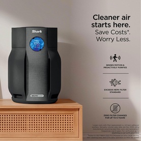 Shark Breathe Clear Compact Charcoal air purifier in black with digital display, shown on wooden sideboard with feature icons