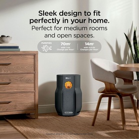 Shark Breathe Clear Compact Charcoal air purifier in dark grey, shown in a modern living room setting with text highlighting 70m&sup2; coverage.