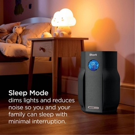 Shark Breathe Clear Compact Charcoal air purifier in Sleep Mode, shown in a softly lit bedroom setting with a child's nightlight.