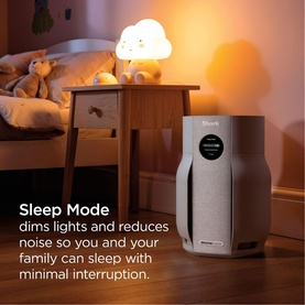 Shark Breathe Clear Compact Dove air purifier in grey, shown in a child's bedroom in Sleep Mode, with soft ambient lighting.