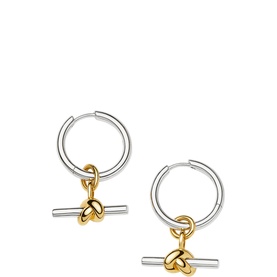 Missoma Mix Metals hoop earrings with gold knotted T-bar charm pendants on silver hoops, two-tone finish