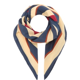 Nili Lotan silk scarf in Vintage Stripes, featuring navy, cream, red and tan diagonal stripe pattern, styled in a loose knot