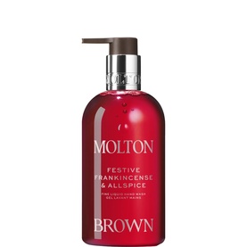 Molton Brown Festive Frankincense & Allspice Fine Liquid Hand Wash in red pump bottle with silver dispenser