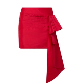 Rotate mini skirt in Scooter Red with ruched bodice detail and draped bow side tie, 100% polyester