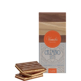 Venchi Cremino 1878 layered milk chocolate bar with packaging, showing caramel and chocolate striped layers