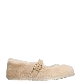 Birkenstock cream shearling Mary Jane flat with gold-tone buckle strap and fluffy textured upper, side view