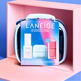Laneige Tint & Glow Trio 3-piece skincare set in blue zip case with cream, moisturiser and lip product visible