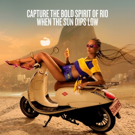 Sol De Janeiro Cheirosa 62 Intense Perfume Mist lifestyle shot: model on vintage scooter at Rio beach, evoking the fragrance's bold Brazilian spirit.