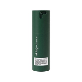 The Skin Nerd Retinal .06% + Peptides retinoid serum in a dark green pump bottle