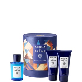Acqua Di Parma Mirto di Panarea Gift Set with EDT bottle, body lotion, and shower gel tubes beside geometric blue gift box