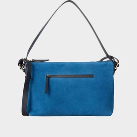 Blue suede crossbody bag with front zip pocket, gold-tone zip pull, and slim dark leather shoulder strap