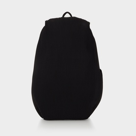 Issey Miyake black pleated polyester backpack with structured silhouette and side pocket, no hardware visible