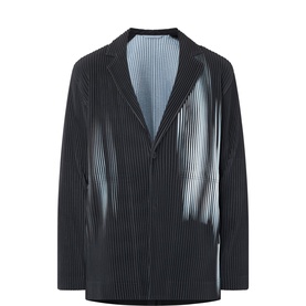 Issey Miyake Shadow Black pleated polyester blazer with notched lapels and structured silhouette, light blue pleat lining visible at back