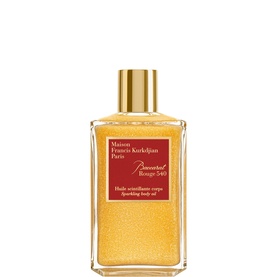Maison Francis Kurkdjian Baccarat Rouge 540 Sparkling Body Oil in a gold-capped glass bottle with golden shimmer formula