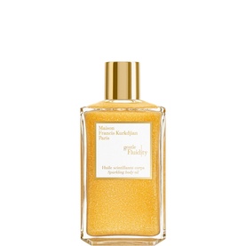 Maison Francis Kurkdjian Paris Oud Satin Mood Sparkling Body Oil in gold shimmer glass bottle with gold cap