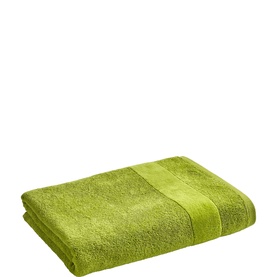 Christys Bath Towel in Mojito green, folded flat showing soft terry fabric and woven border stripe detail.