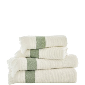 The Lyndon Company sage green and cream ribbed towel set of four, stacked, with fringe trim detail