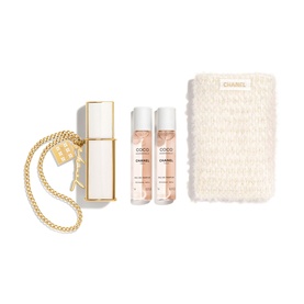 Chanel Coco Mademoiselle fragrance set with gold-chain twist case, two refill sprays, and textured white pouch