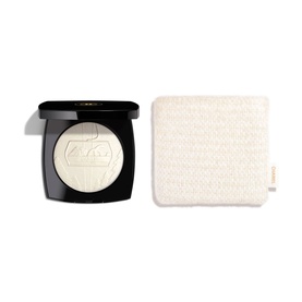 Chanel Highlighter in Neige D'Or, open compact showing luminous pressed powder with textured applicator pad alongside