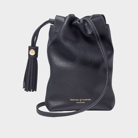 Aspinal of London navy leather bucket bag with tassel detail, gold-tone logo lettering, and slim crossbody strap