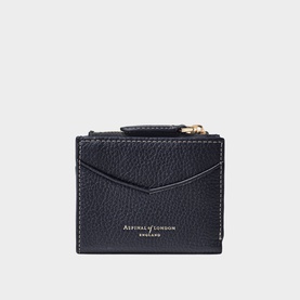 Aspinal of London navy blue pebbled leather compact wallet with gold zip, envelope flap front and contrast stitching detail