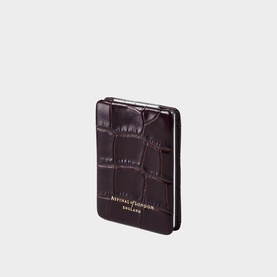 Aspinal of London compact card holder in deep burgundy croc-embossed leather with gold foil branding, rounded edges.