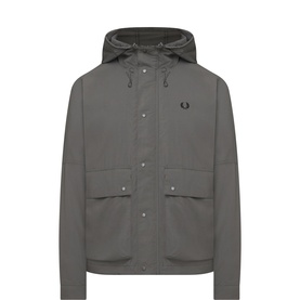 Fred Perry Laurel Wreath Logo Ripstop Parka Jacket in green with drawstring hood, front button pockets, and concealed zip placket