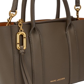 Marc Jacobs forest green leather tote bag with gold-tone double J charm, tassel detail, and short top handles