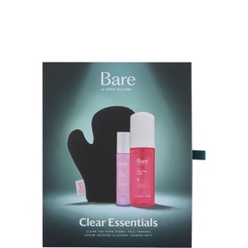 Bare by Vogue Clear Essentials skincare set with tanning serum, prep spray and application mitt on dark teal background