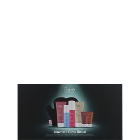 Bare by Vogue Ultimate Glow Ritual skincare set, multiple tubes and bottles in assorted colours with black applicator mitt