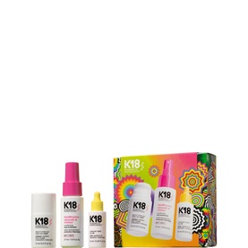 K18 Hair Care Set with shampoo, leave-in treatment oil, and mist spray, displayed with colourful branded gift box packaging