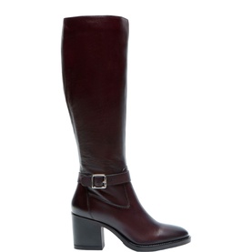 Burgundy leather knee-high boot with block heel, silver buckle strap detail at ankle, and pointed toe on white background