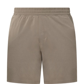 Lululemon Cypress Forest performance shorts, elasticated waistband, lightweight woven fabric, flat-lay back view