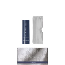 Trinny London The Sleep and Treat Set featuring a navy serum, silver eye mask, and branded gift box