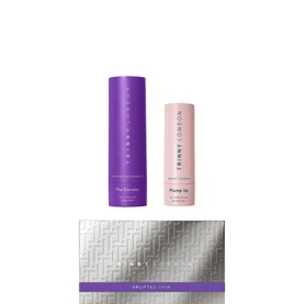 Trinny London The Uplifted Skin Set, three-piece skincare gift set with purple tube, pink tube, and silver embossed box.