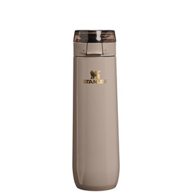 Stanley hydration bottle in Bedrock Gloss, flip-lock lid with gold branding, smooth tapered design