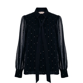 Phase Eight black sheer blouse with gold embellishments, tie neck, and semi-sheer balloon sleeves with velvet bodice panel