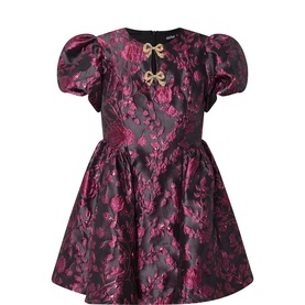 Sister Jane black floral jacquard dress with puff sleeves, full skirt, and gold bow embellishment at neckline