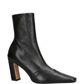 Black leather square-toe ankle boot with block heel and tan sole, side zip fastening, mid-calf height
