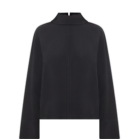 Selected Femme black viscose top with high mock neck, long flared sleeves, and back button detail, flat lay shot