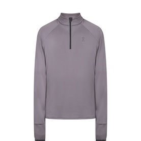 On Running Climate Half-Zip long-sleeve top in muted purple, with small logo at chest and ribbed cuffs